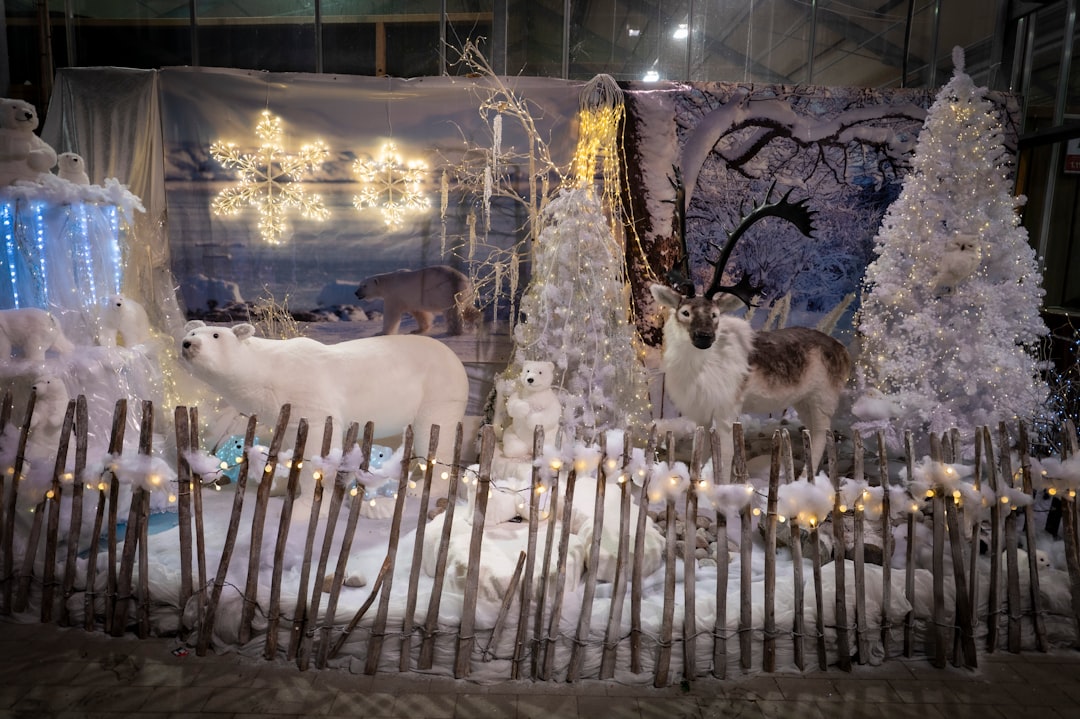Winter wonderland display with polar bear and reindeer.